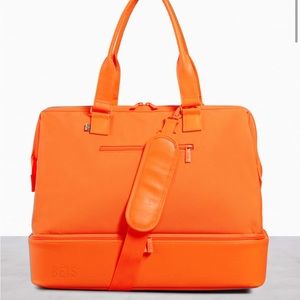 Beis the mini Weekender in creamsicle orange limited edition